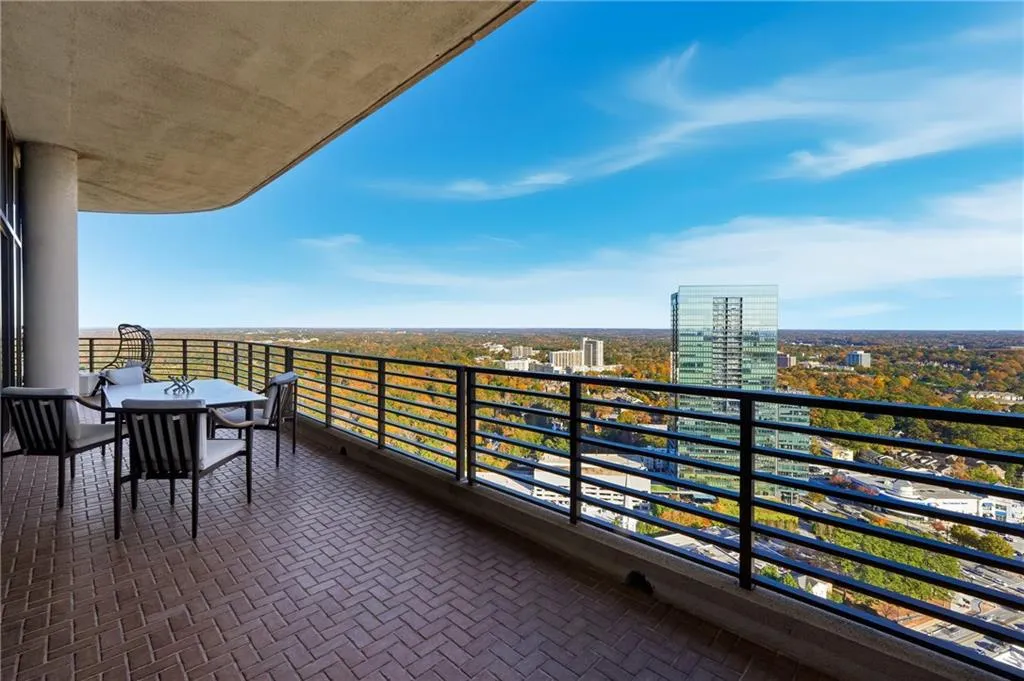 Balcony designed for luxury living: ample space, sleek lines, and stunning views that stretch across Buckhead and beyond.
