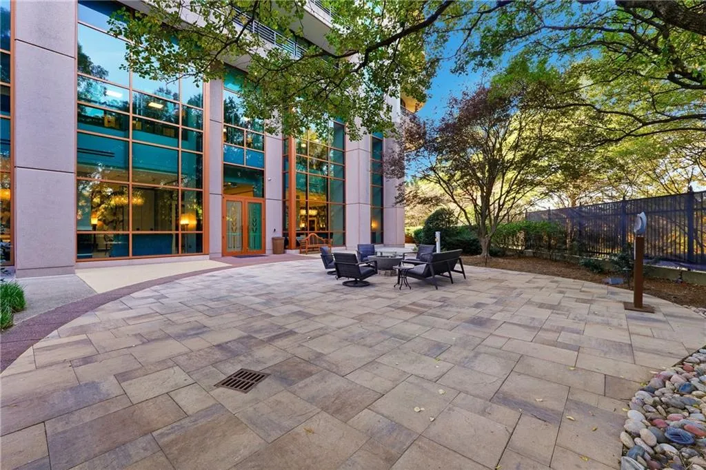 Lush landscaping and comfortable seating create a private, upscale setting just beyond the lobby.