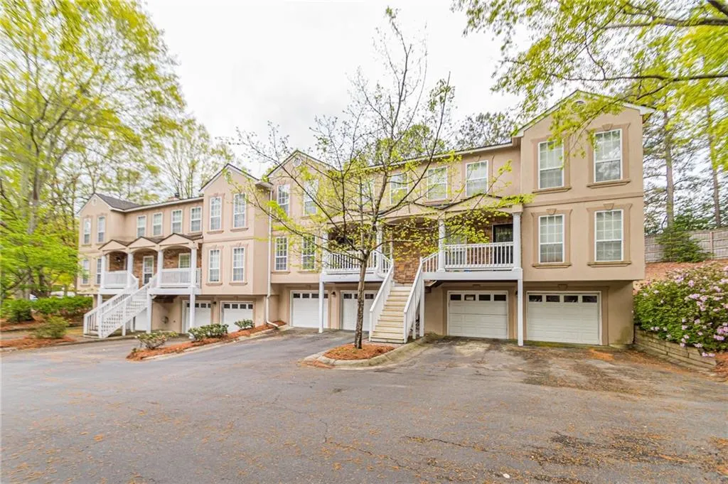 View of property with a garage