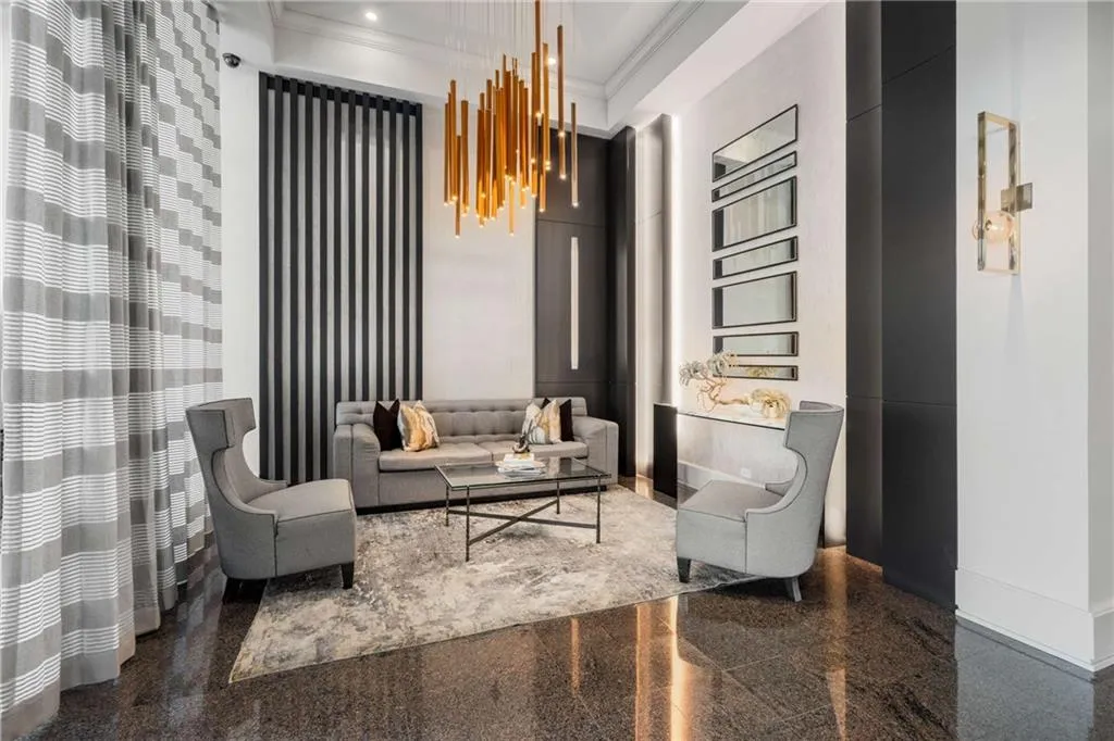 Living area featuring ornamental molding