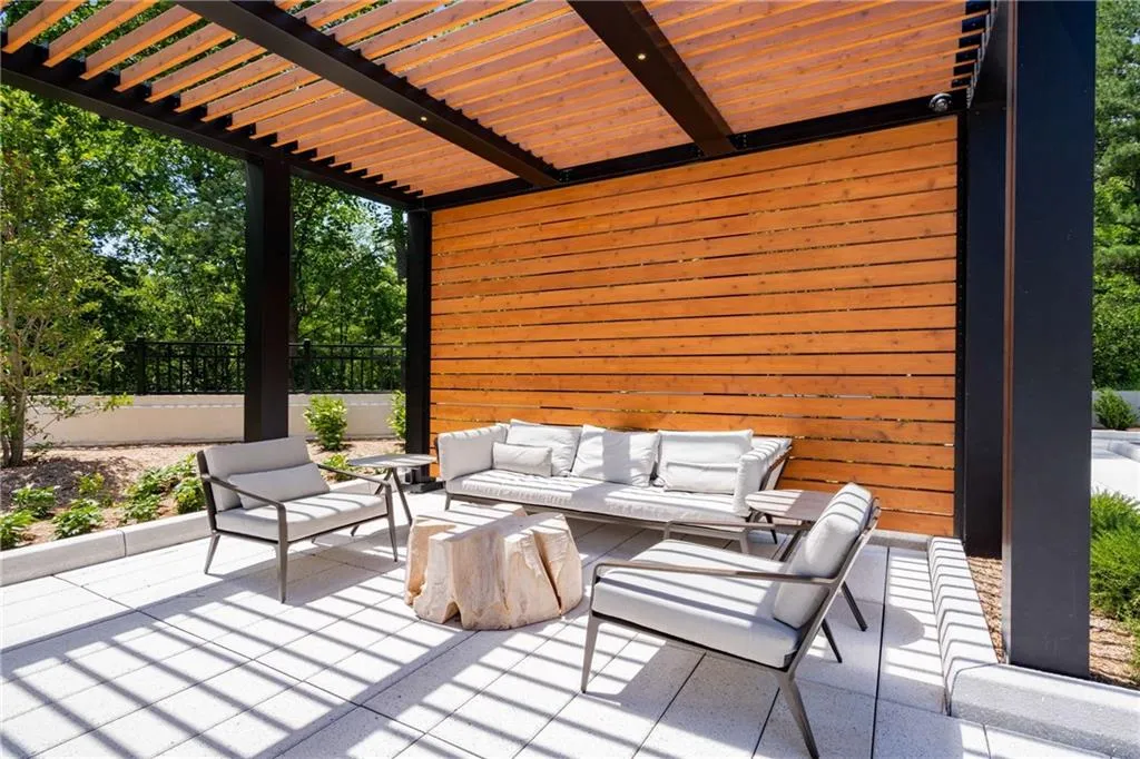 View of patio featuring outdoor seating and a pergola