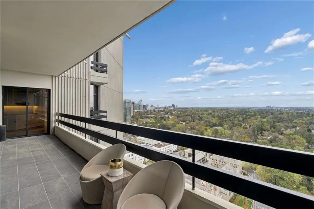 Balcony featuring a view of city