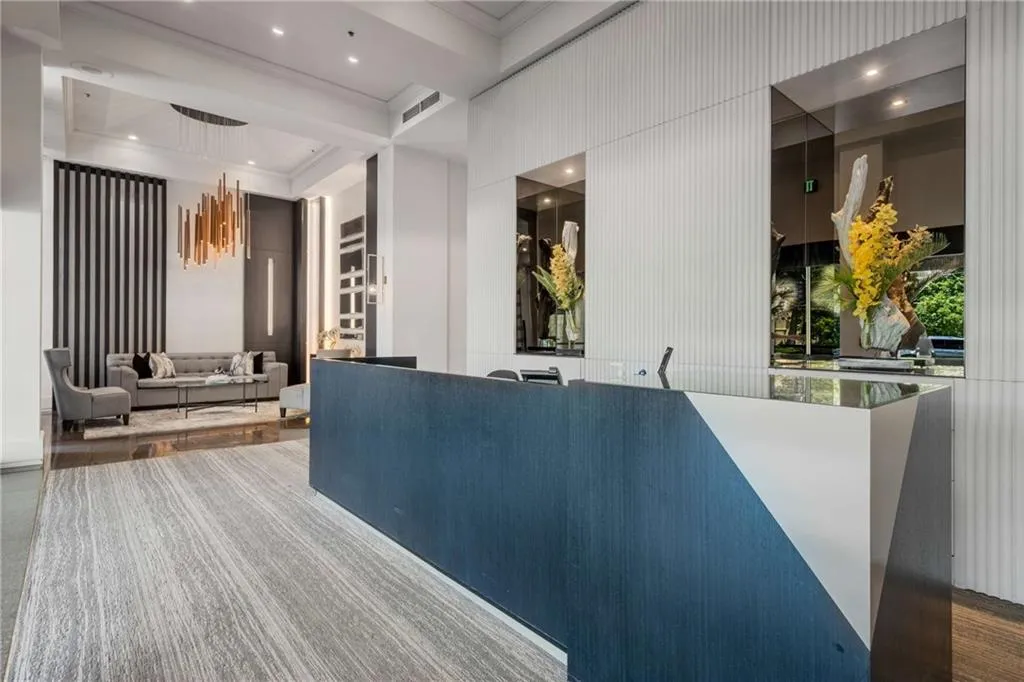 Reception with recessed lighting and ornamental molding