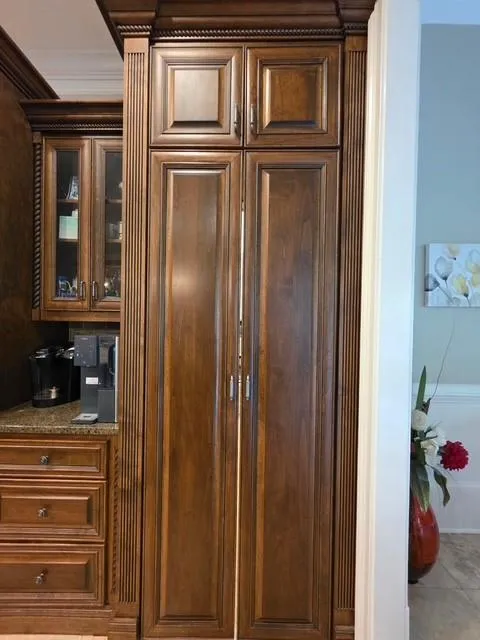 Closed Doors to Walk-in Pantry.