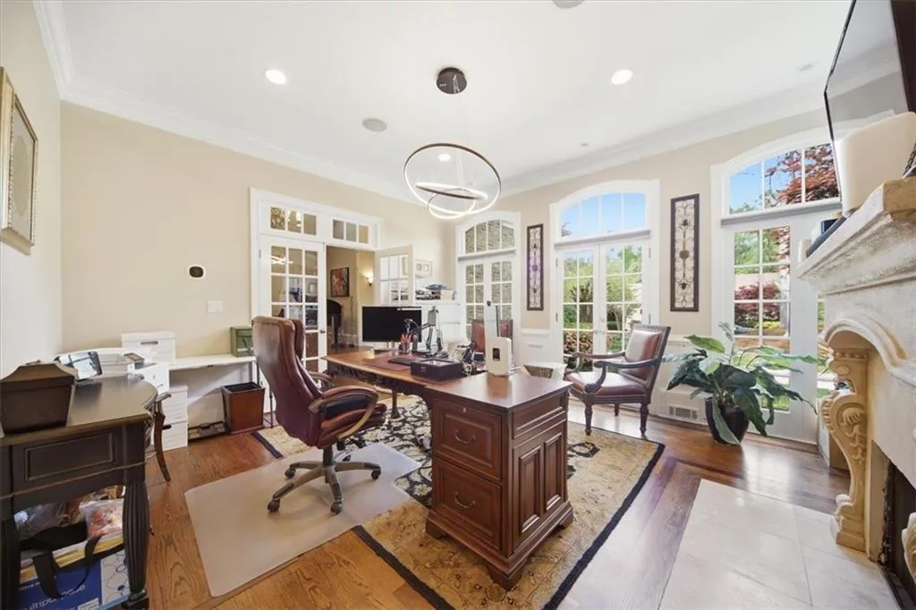 Dining Room is currently being used as an Office space, which also features the 2nd of the 6 fireplaces in this home.