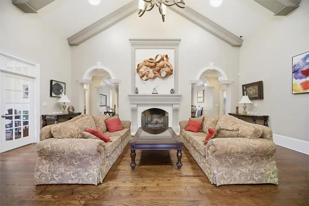 Living Room featuring 1 of the 6 Fire Places in this home.