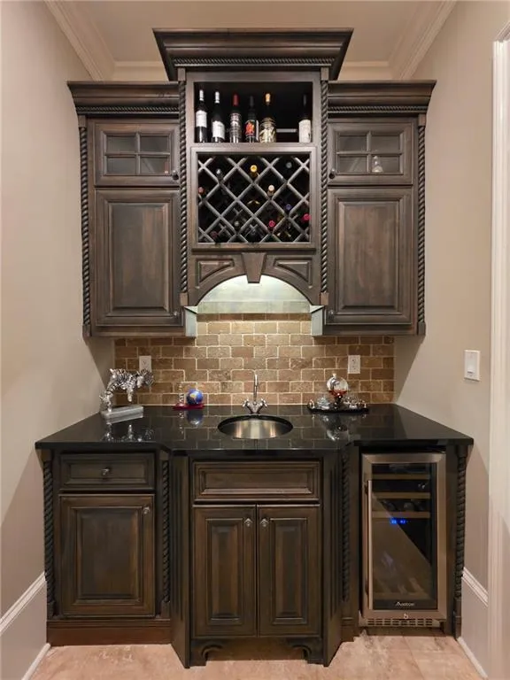Butler's Pantry with wine refrigerator.