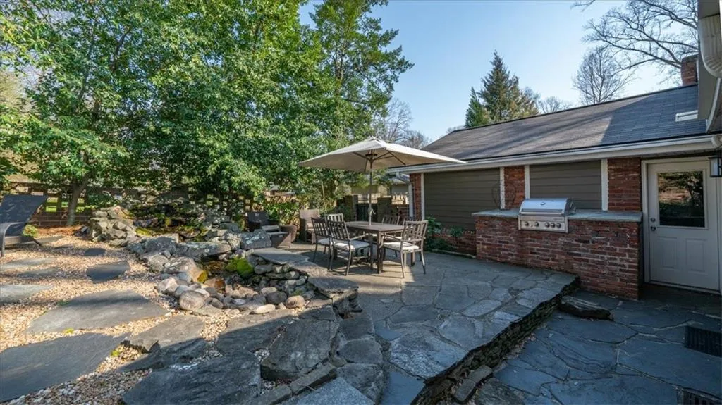 View of patio / terrace with exterior kitchen and area for grilling