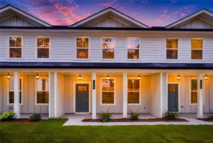 Modern townhome exteriors featuring horizontal and vertical siding