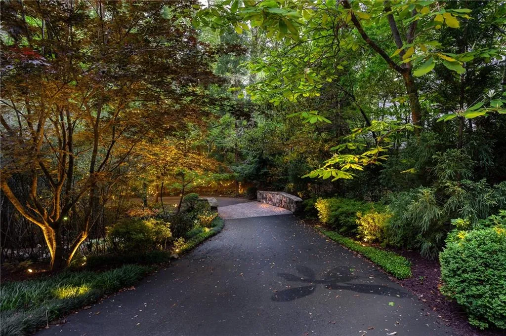 Long private meandering driveway at dusk