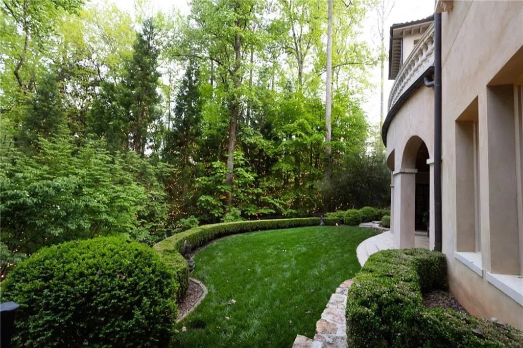 View of bocce ball court off of terrace level living room