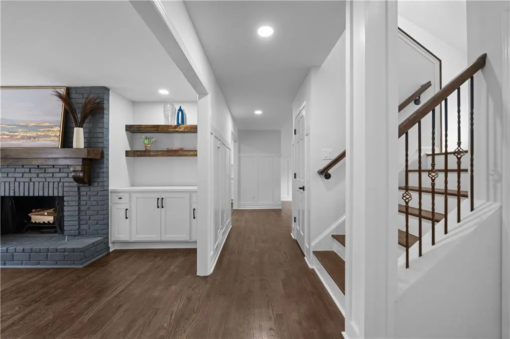 Hallway featuring dark hardwood / wood-style floors