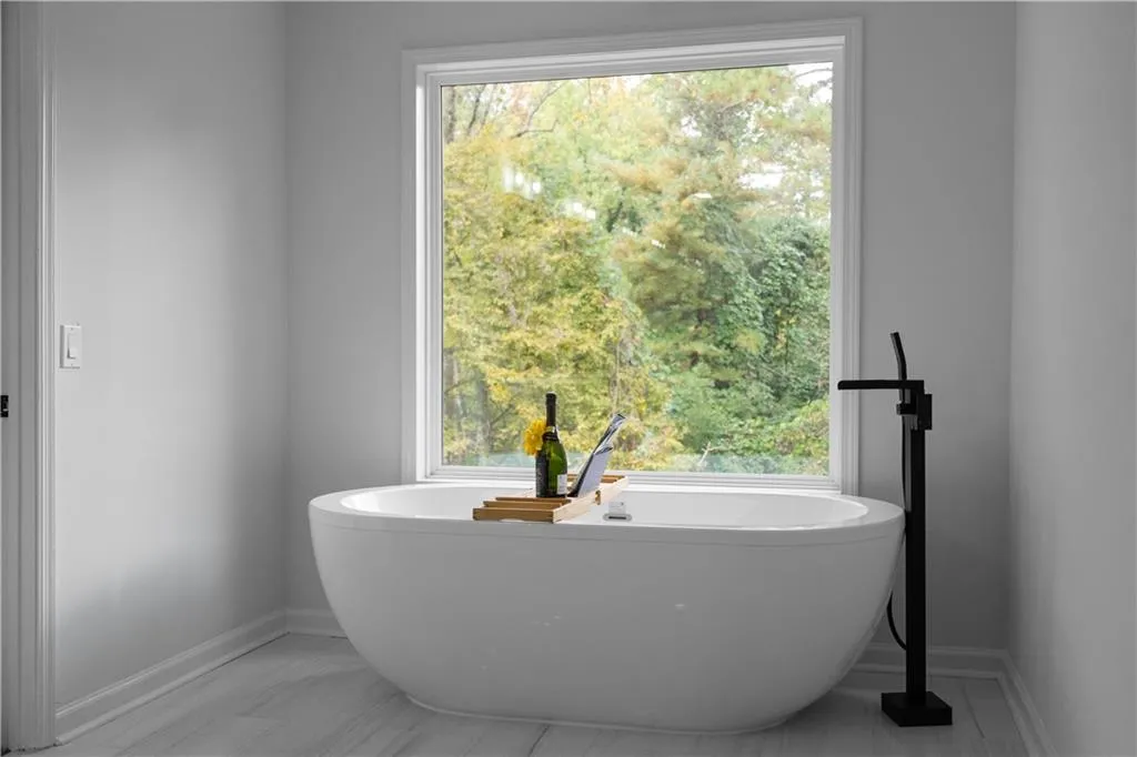 Bathroom featuring a tub