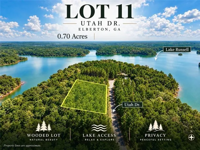 Wooded 0.70 acre lot on Utah Drive, featuring lake access to Lake Russell