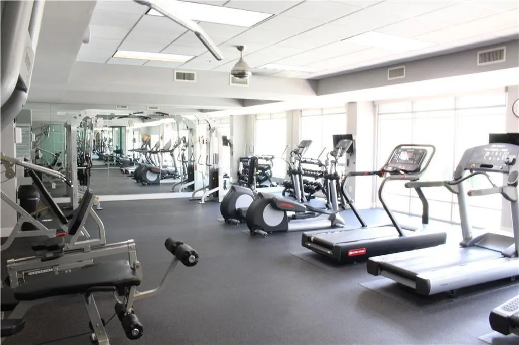 Gym featuring a paneled ceiling
