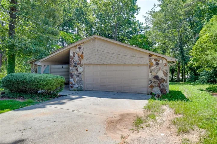 Welcome home to this charming ranch nestled on a private wooded lot with mature trees and a spacious two car garage.