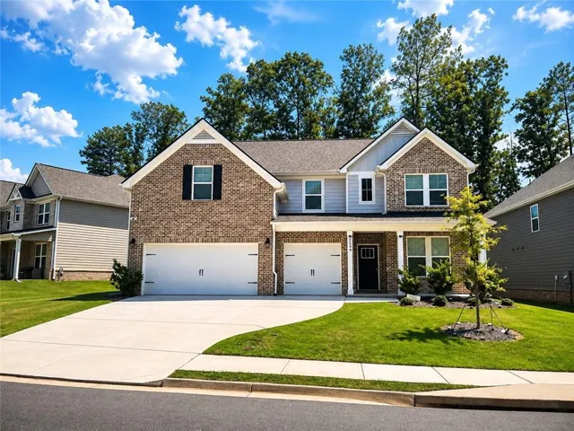 Brick and siding exterior with a gabled roof