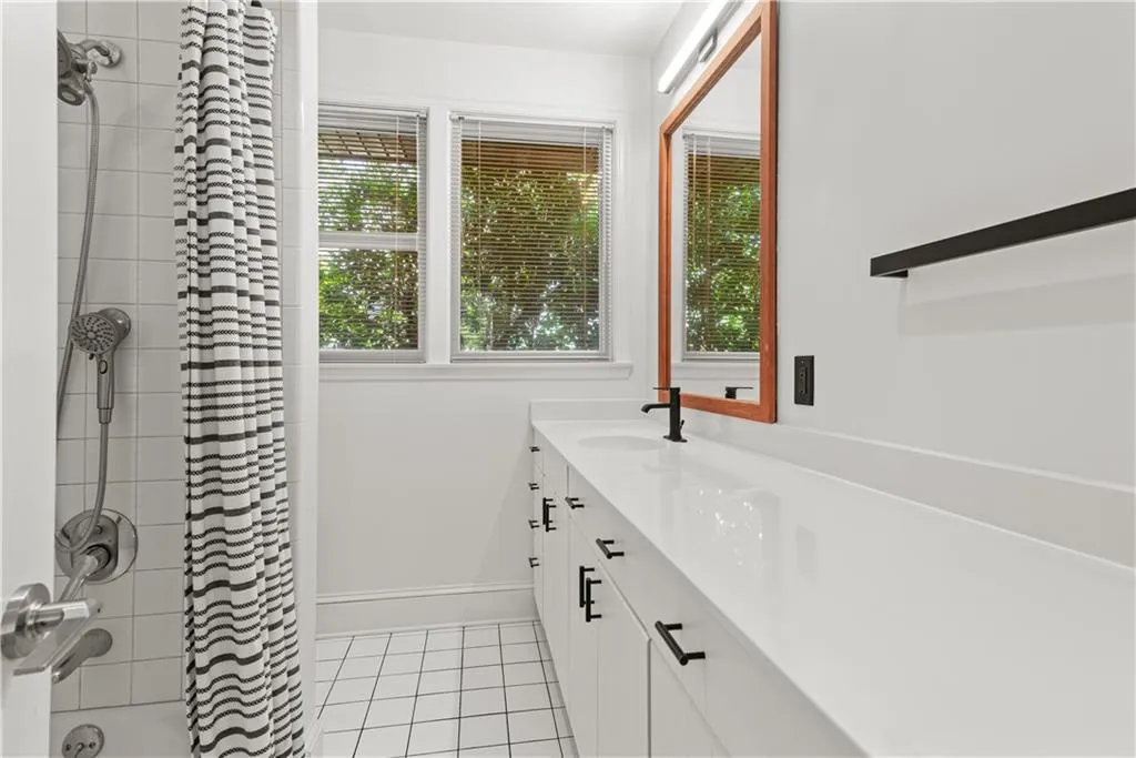 Enormous renovated bath.