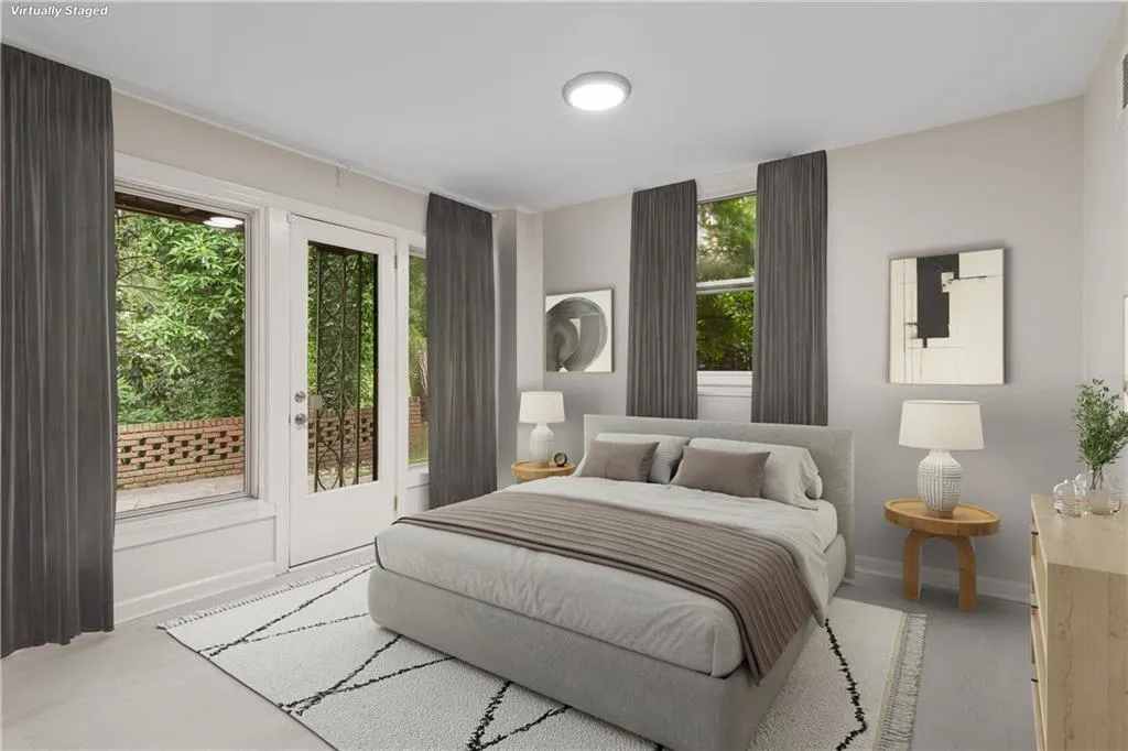 Terrace level bedroom with outdoor access.