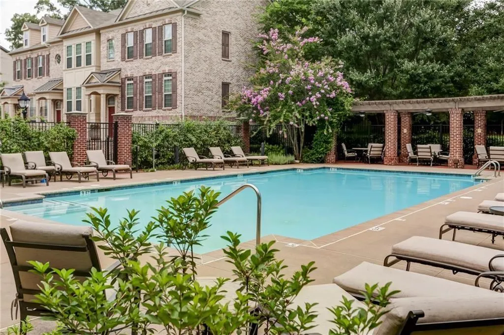 Community pool featuring a patio area