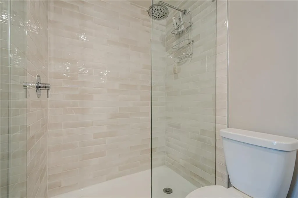 New Seamless Glass shower and tile