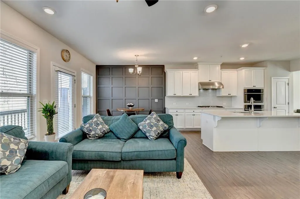 Living area featuring recessed lighting and wood finished floors