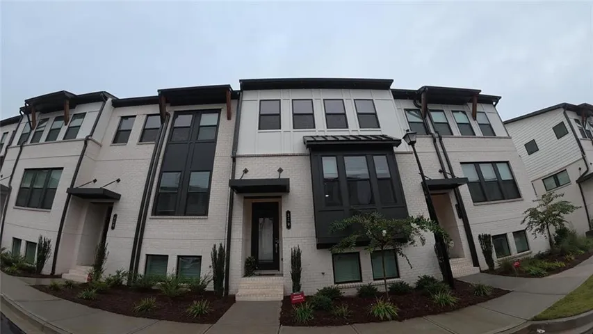 View of front of home with brick siding