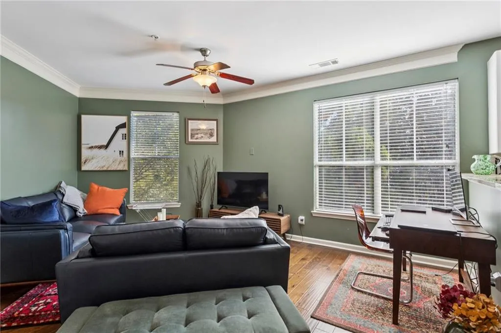 The unit overlooks the tree canopy