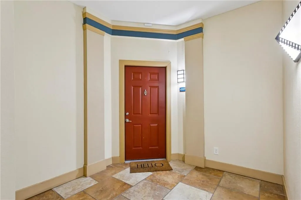 A VERY RARE corner unit with a private entry way