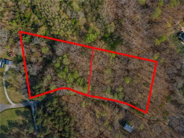 This photo is an approximation of the new lot lines; the former 4.37 parcel has been officially subdivided into two 2+ acre parcels.
