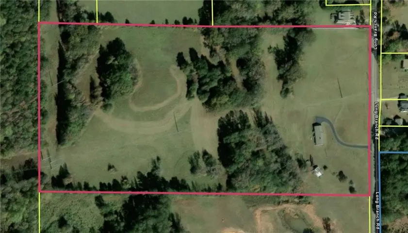 Aerial Map. Outlining the property boundaries and road access