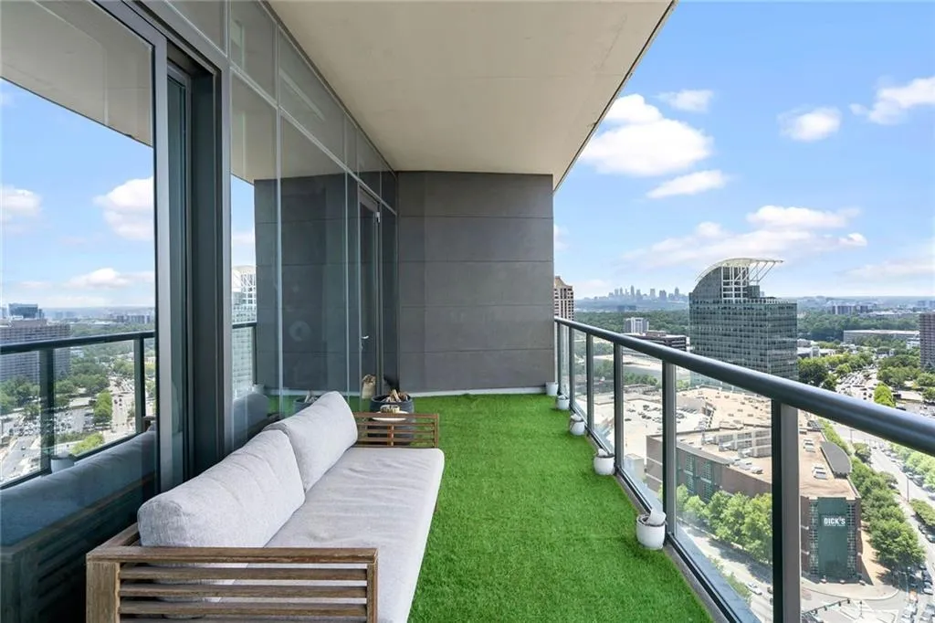 Balcony featuring a view of city