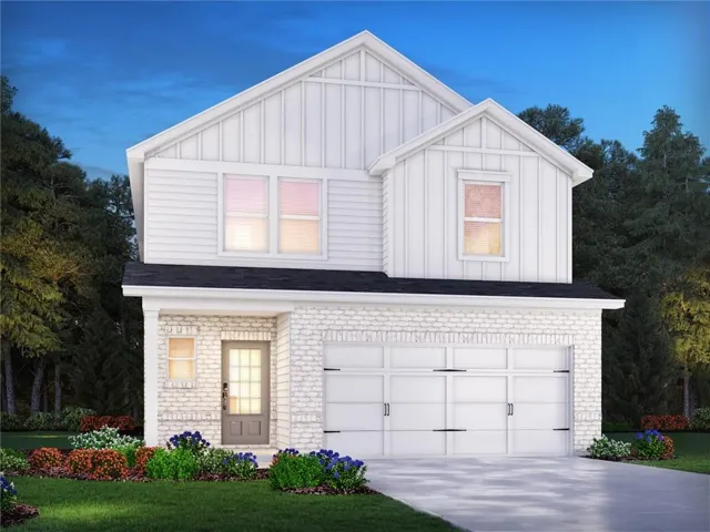 Contemporary two-story residence featuring a white brick and horizontal siding facade