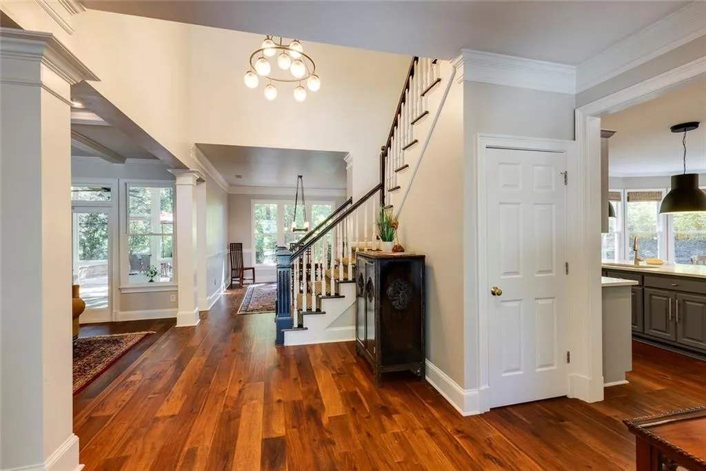 Two-Story Foyer with Wide Plank Wood Flooring, Fresh Paint & New Fixtures