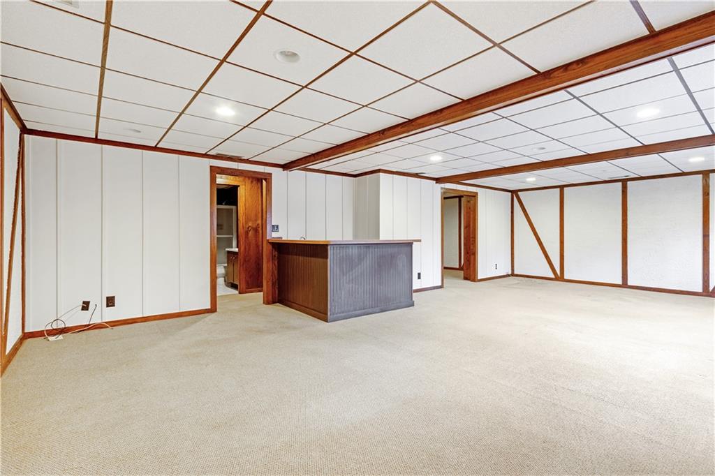 Finished portion of basement with exterior entrance and tons of natural light