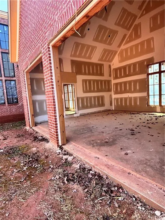 Misc room featuring brick wall