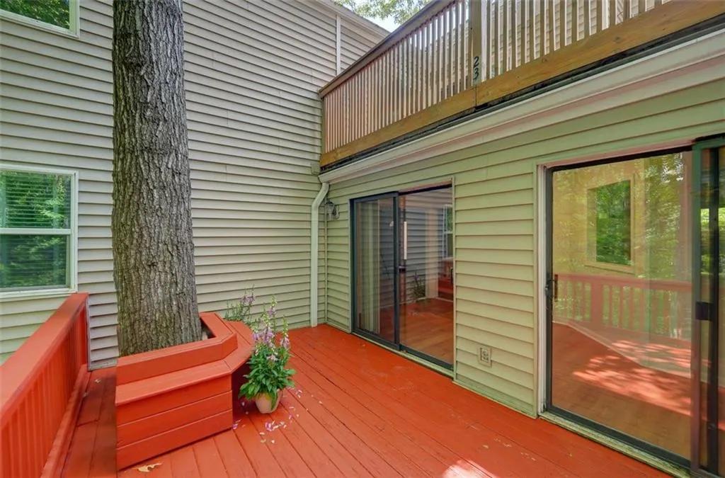Large private back Deck looking at serene wooded setting