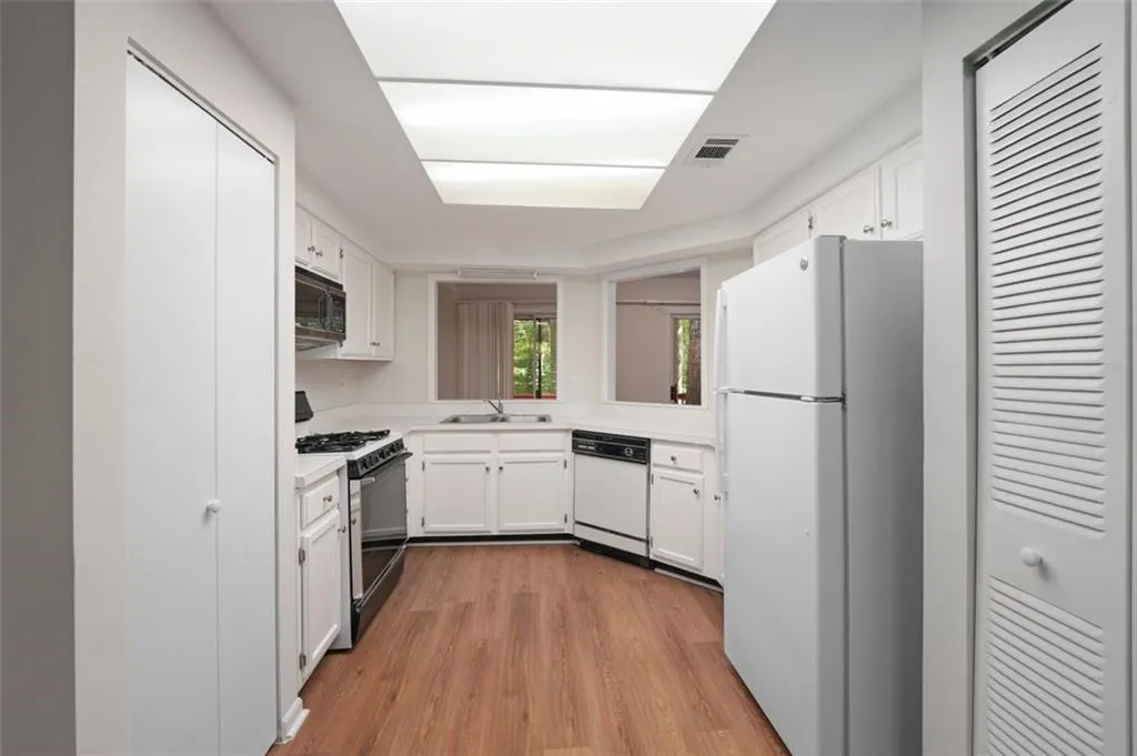 Kitchen with tons of cabinetry and separate pantry