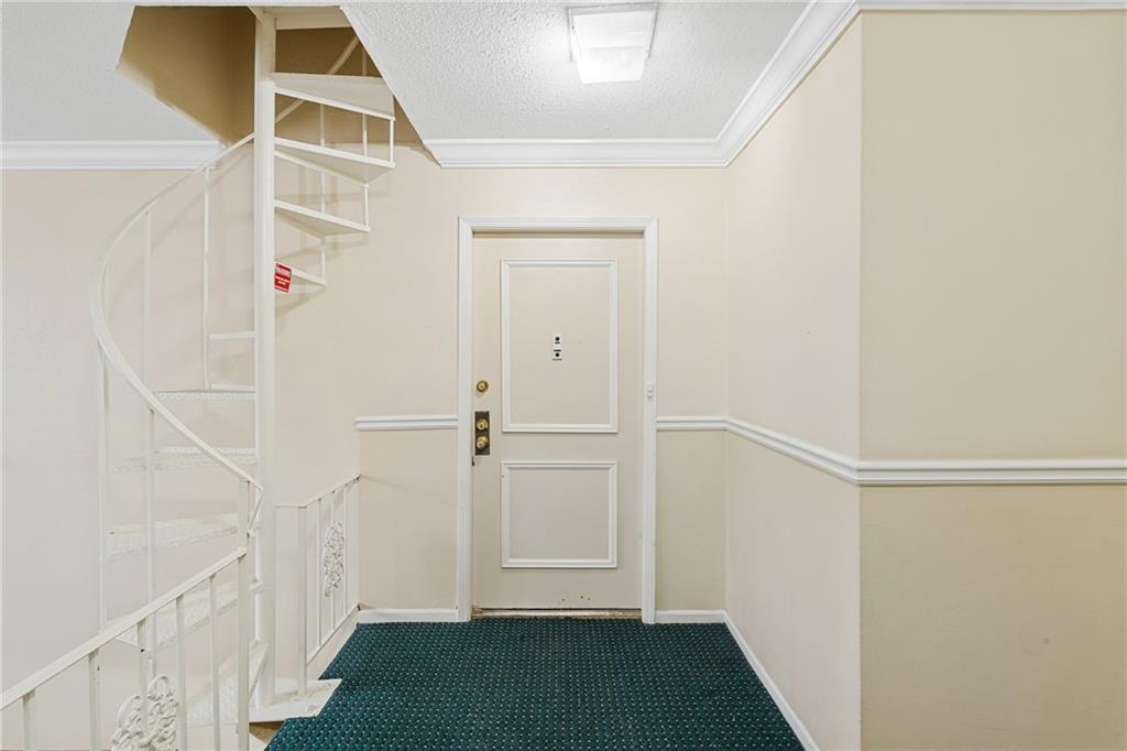 Spacious closet with carpet flooring
