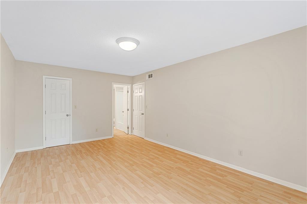 Spare room with light hardwood / wood-style flooring
