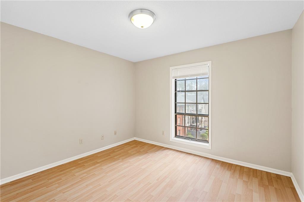 Spare room featuring light hardwood / wood-style flooring