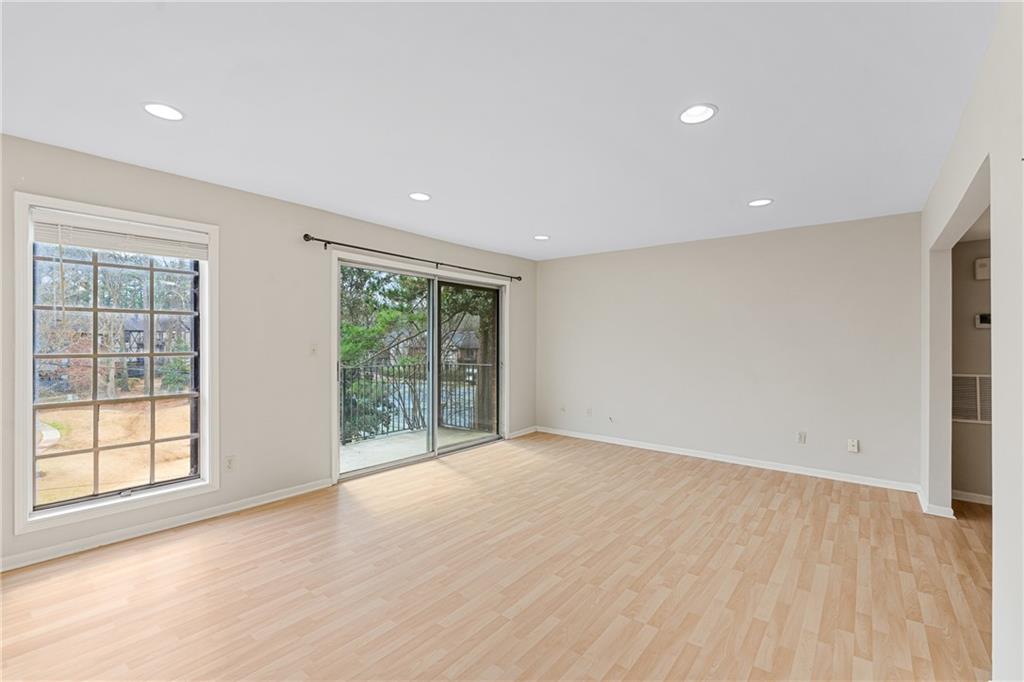 Spare room featuring light wood-type flooring