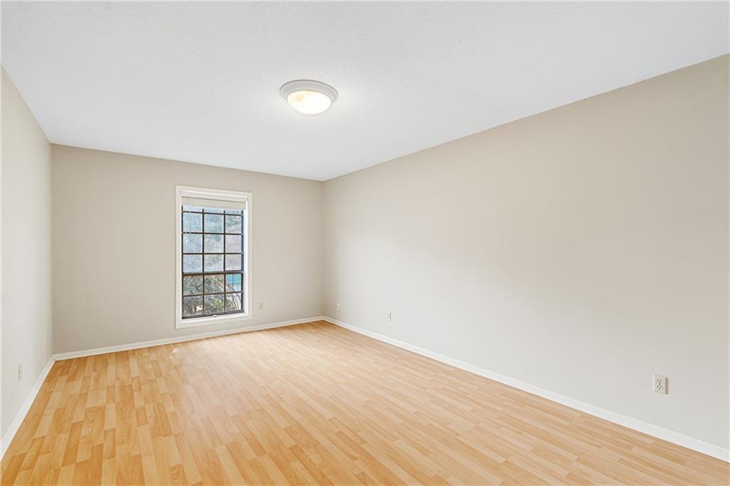 Spare room with light hardwood / wood-style floors