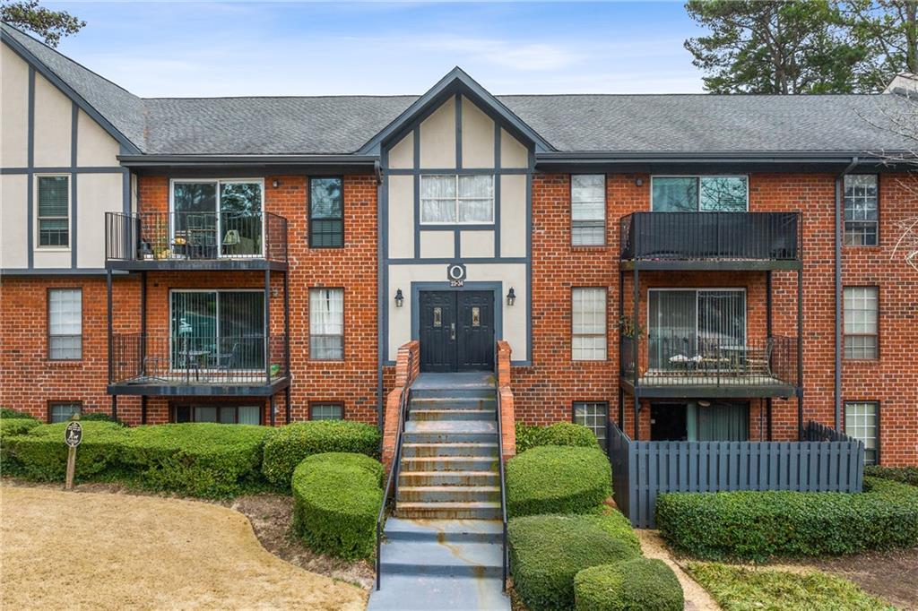 Multi unit property featuring a balcony