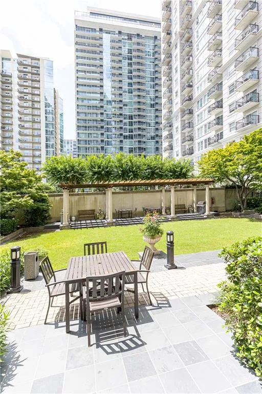 View of patio with outdoor dining space