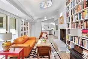 Library-Sitting Room with light porcelain flooring