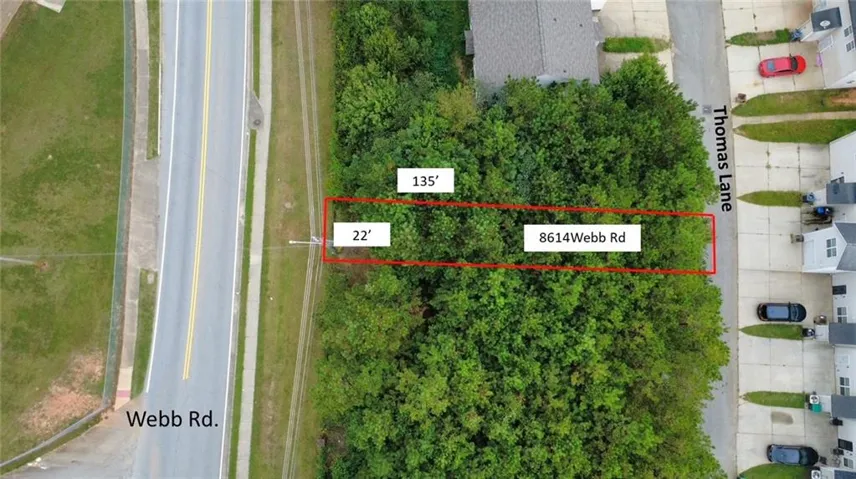 Aerial map of property and surrounding area featuring property parcel outlined