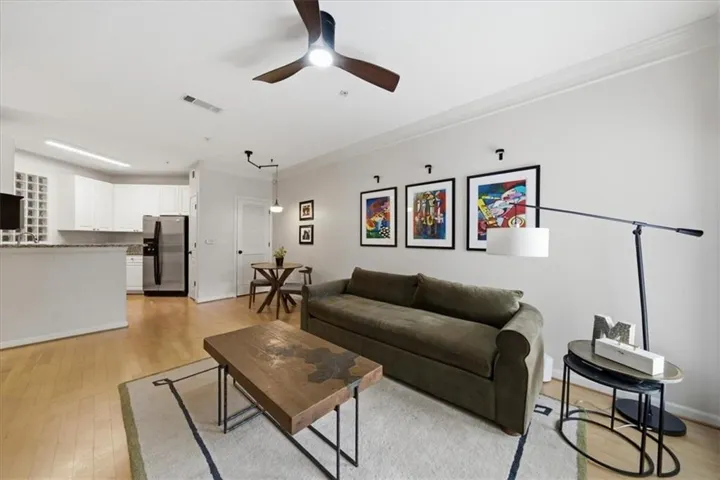 Open-concept living featuring a beautiful neutral pallet and natural light!