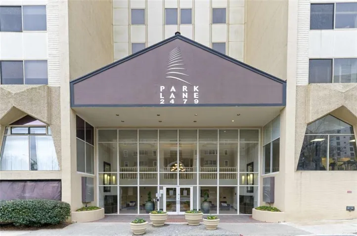 Front of Structure - Welcome to Parklane on Peachtree situated in prestigious Buckhead but without the high ticket price! The building has everything from 24 hour Concierge, onsite gym, pool, multiple grilling stations, dog walk, onsite property management, gated parking, clubroom with billiard table and bar area. The building has it all! All utilities except Internet and TV are included in the monthly HOA fee.