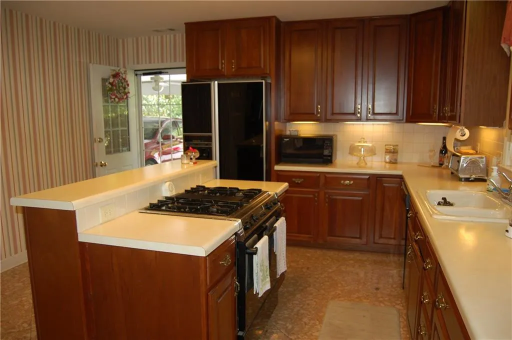 1120 Kingston Drive, Atlanta, Georgia 30342, 5 Bedrooms Bedrooms, ,2 BathroomsBathrooms,Residential,Sold,1120 Kingston Drive,5831251